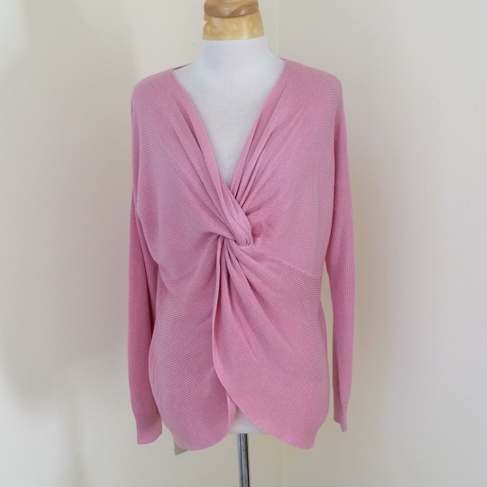 Laurie Felt medium pink twisted front sweater.
